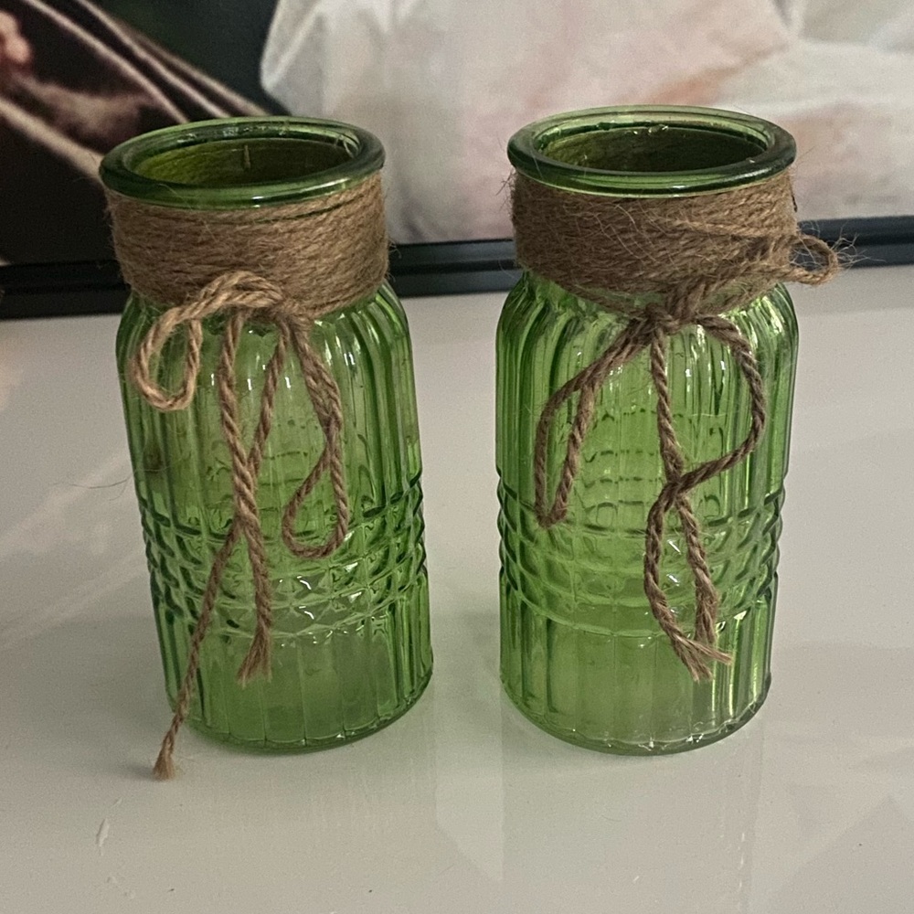 2 green glass jars